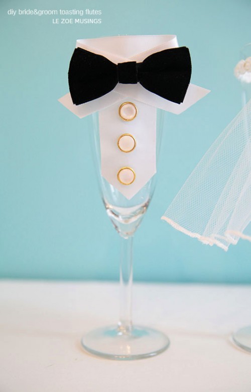 diy-bride-and-groom-toasting-flutes