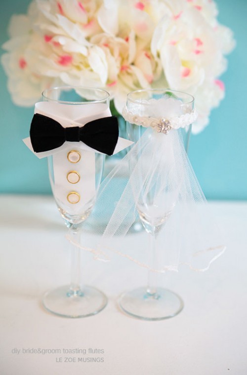 diy-bride-and-groom-toasting-flutes