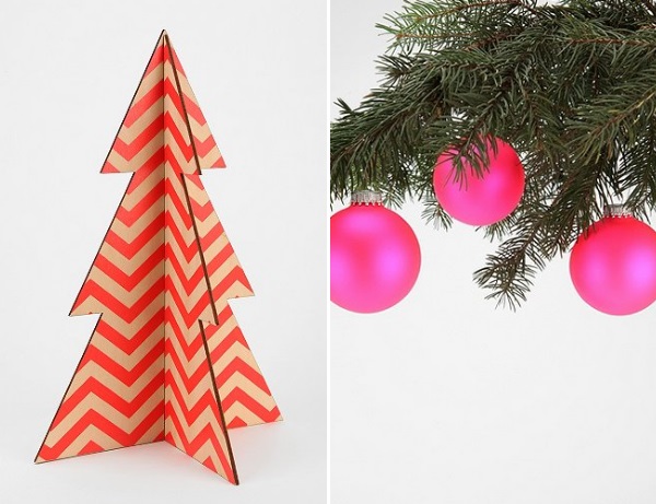 Элементы праздничного декора: красная бумажная ёлочка и розовые шары