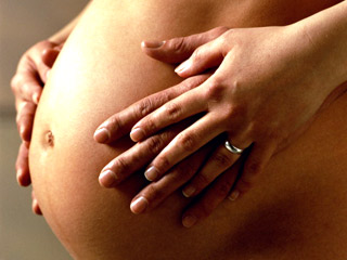 Большой живот беременной