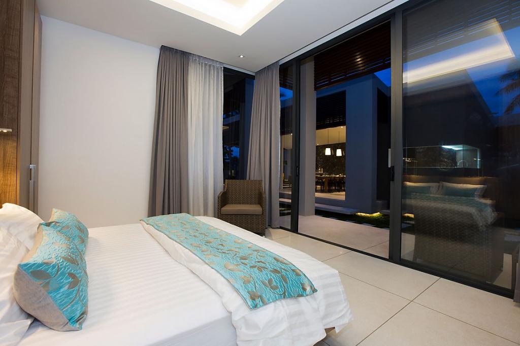 Спальня в отеле Mandalay Beach Villas