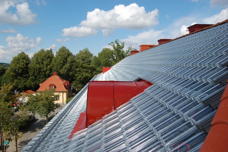 solar heating just got stylish innovative glass roof tiles for energy efficient-homes-02