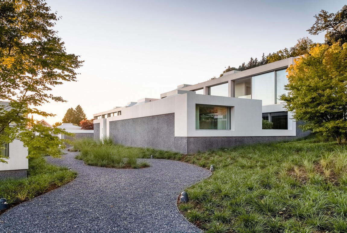 Элегантный дизайн виллы 4 Courtyard Houses в современном минимализме в Швейцарии