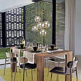 brushed-nickel-chairs-and-a-wooden-parsons-table