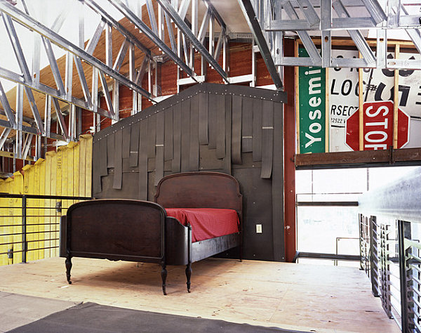 modern-bedroom-with-salvaged-metal-signs