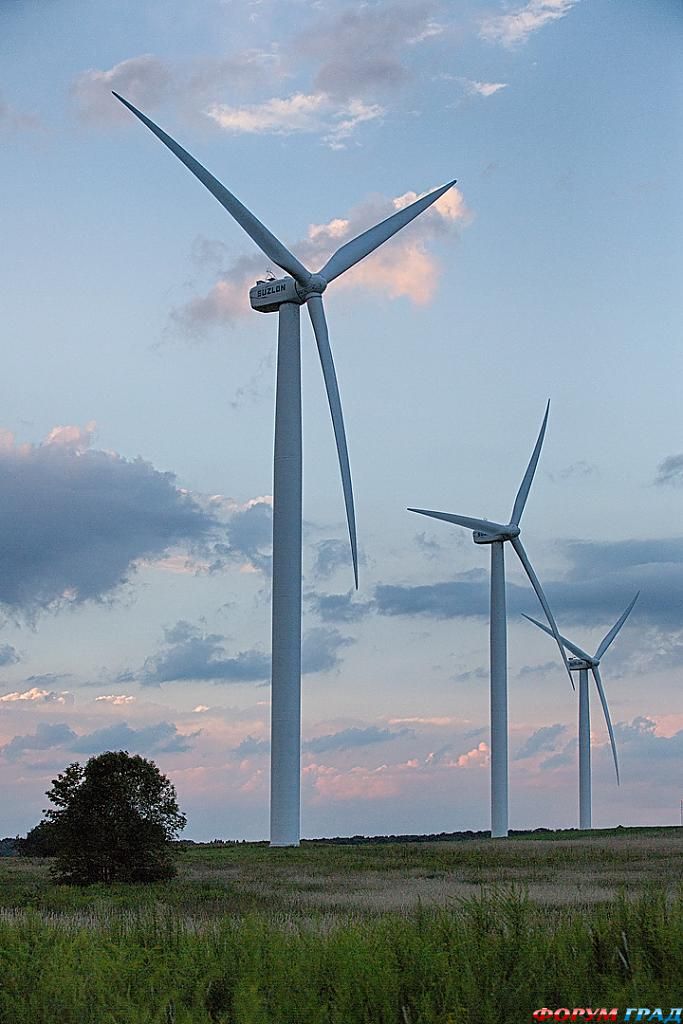 3-wind-turbines-at-sunset-03