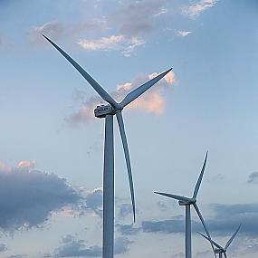 3-wind-turbines-at-sunset-03