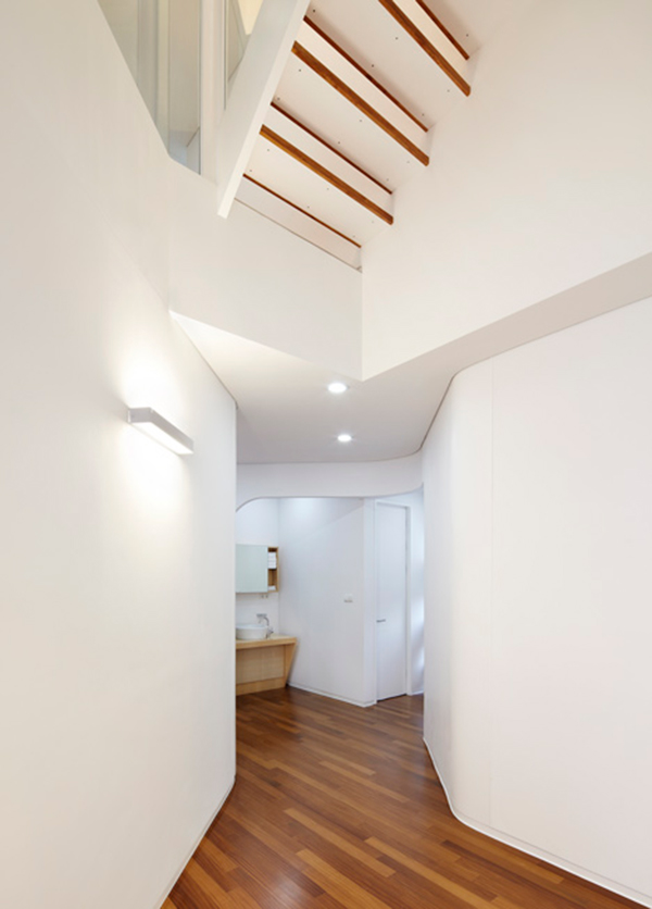 Eccentric White Residence With Square Perforations