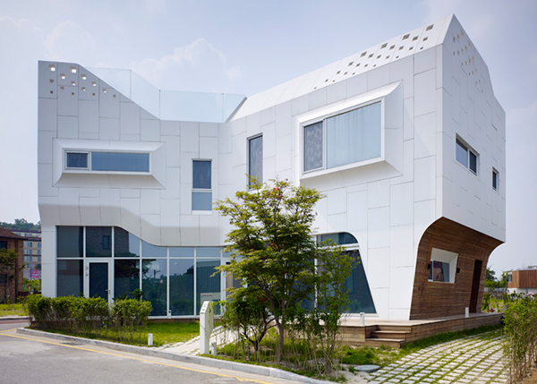 Eccentric White Residence With Square Perforations
