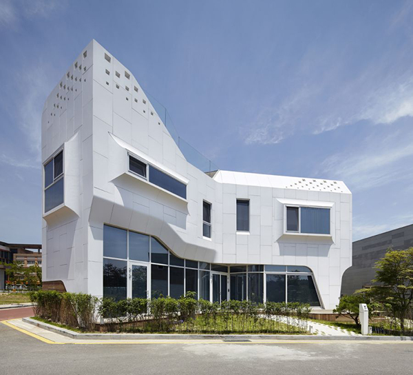 Eccentric White Residence With Square Perforations