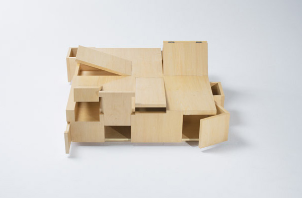 a-table-made-of-secret-compartments-03