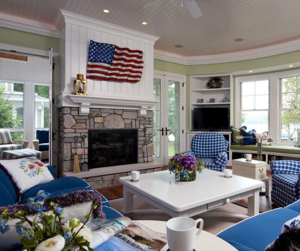 cool-blue-cushions-and-white-walls-complement-the-flag-above-the-fireplace-elegantly