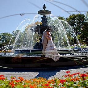 bride-and-groom-on-fountain-11